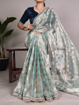 Elegant Peach and Silver Banarasi Silk Saree with Zari Work and Contrast Blouse