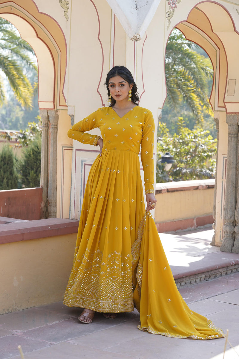 Yellow , Blue Faux Georgette with intricate Zari & Sequins Embroidery Gown.