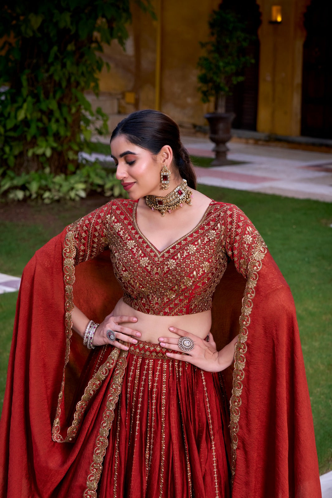 Designer Rust Orange Rangoli Silk Lehenga Choli