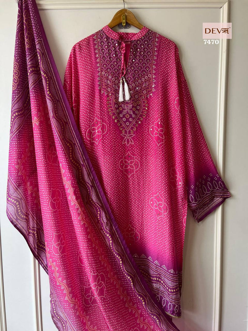 Heavy Chinon silk with digital print, royal mirror handwork, tassels & latkan